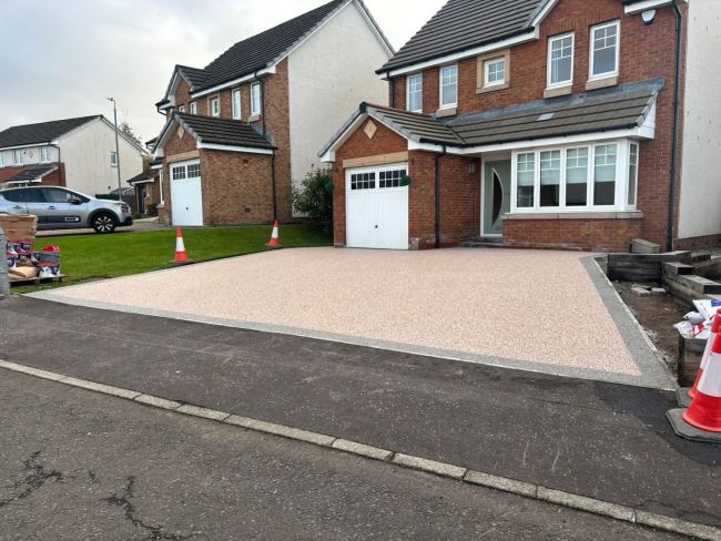 A resin driveway in front of a house
